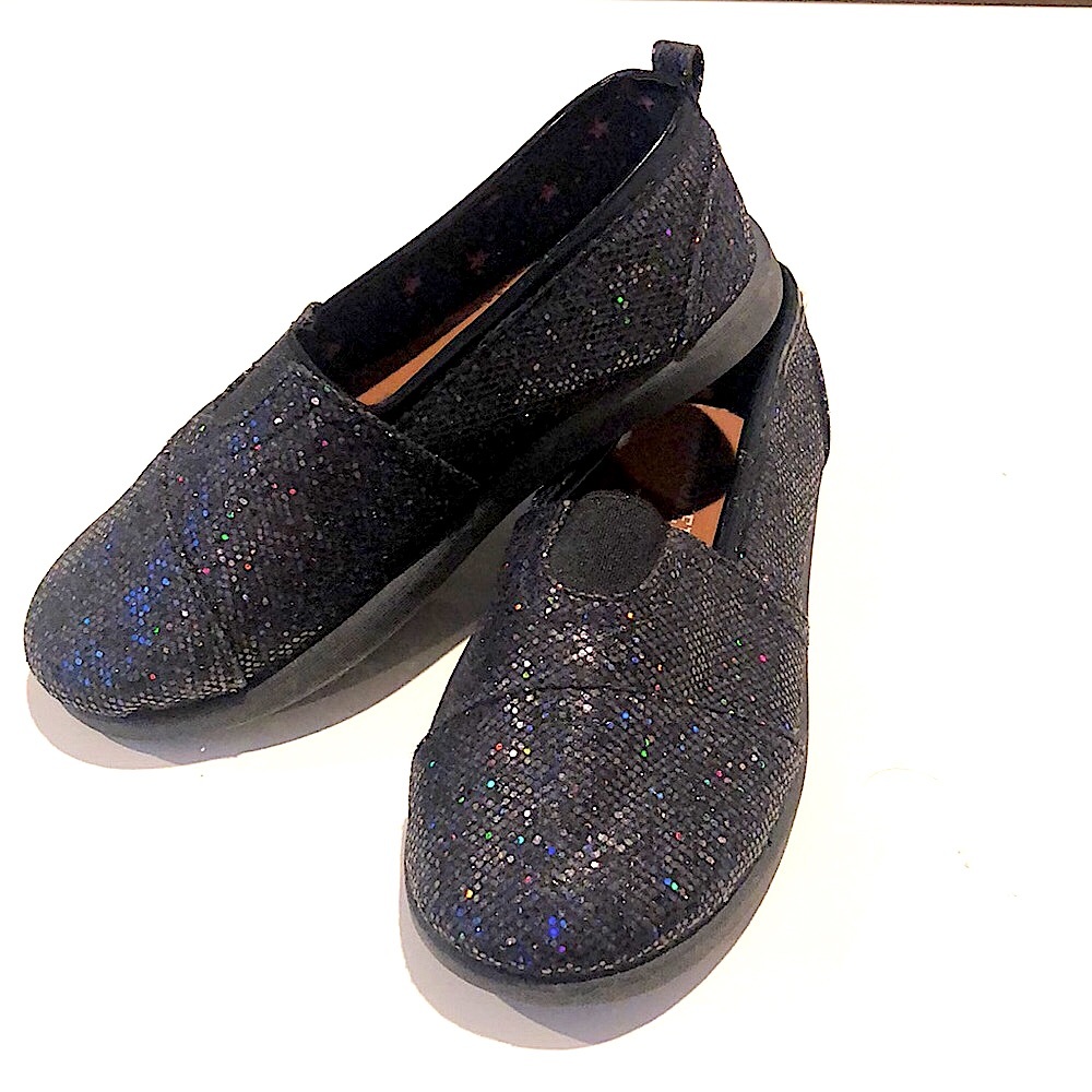 New black hologram slip ons